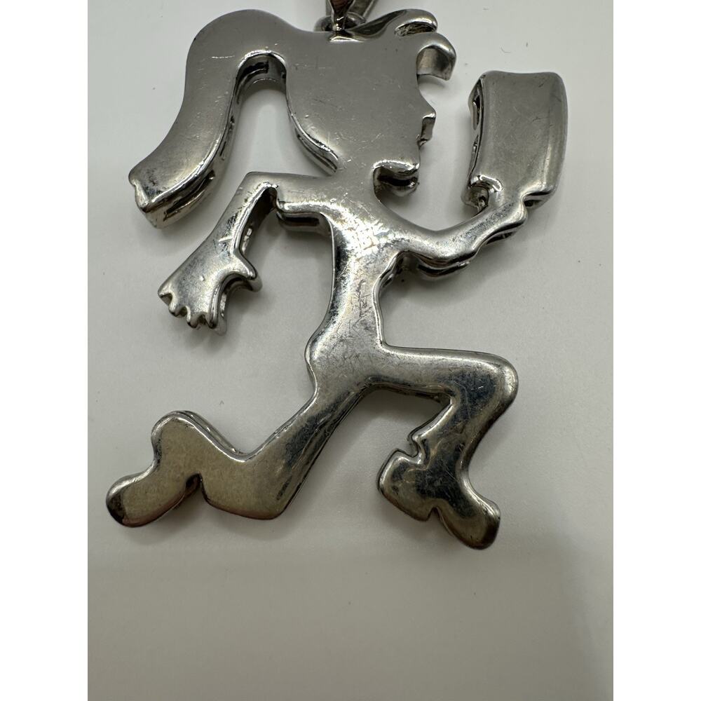 Hatchet Girl Silver Tone Metal Pendant 3” - Picture 2 of 5